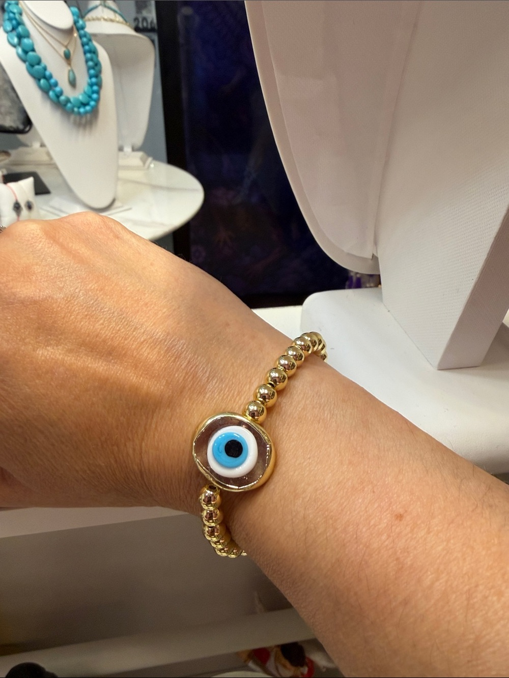 Gold Beaded Bracelet with Blue Evil Eye Charm